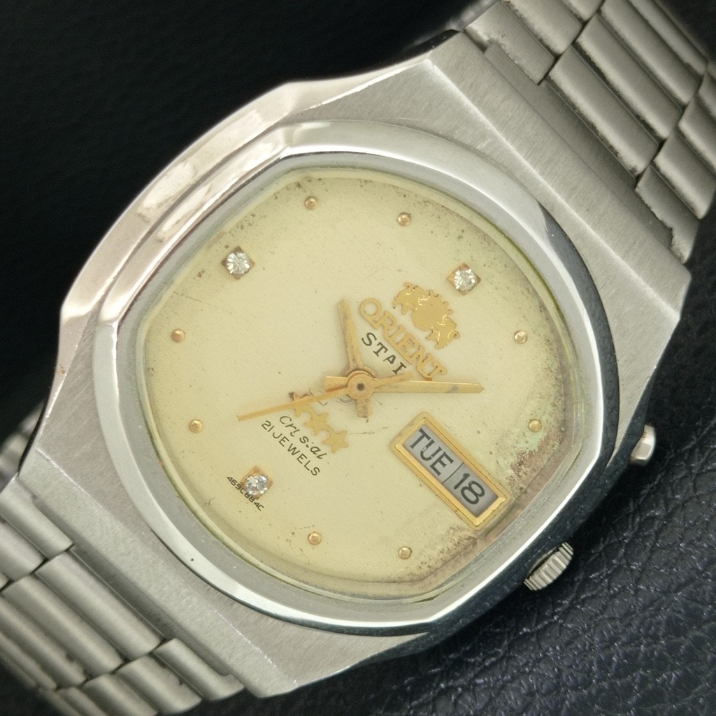 Vintage 1980 Orient Automatic Mens Silver Watch WDaydate  Gold Accents